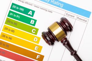 Judge gavel over efficiency chart – view from top